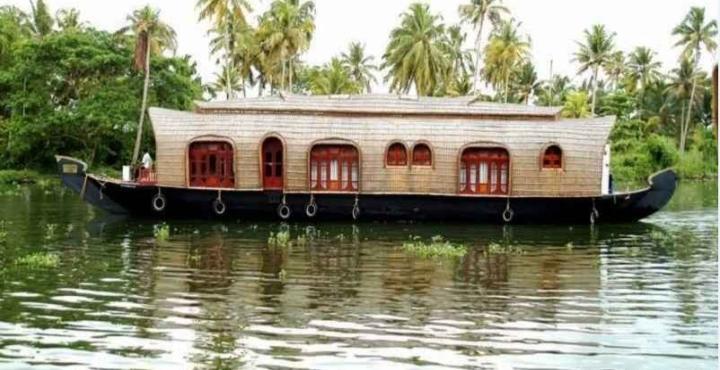 Готель Aqua Jumbo Houseboats Кумараком Екстер'єр фото