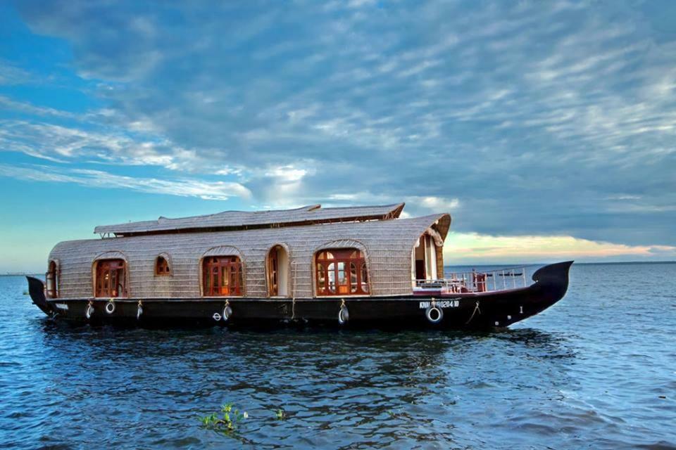 Готель Aqua Jumbo Houseboats Кумараком Екстер'єр фото